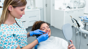 Woman getting check up after Dental Implants